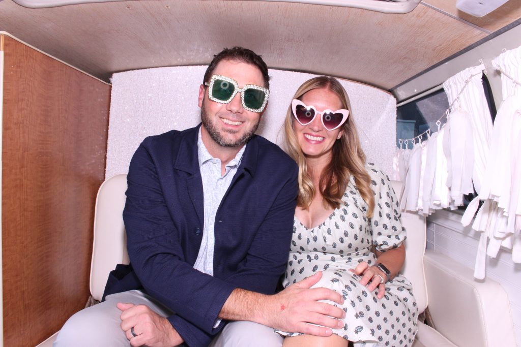 a couple in a photo booth